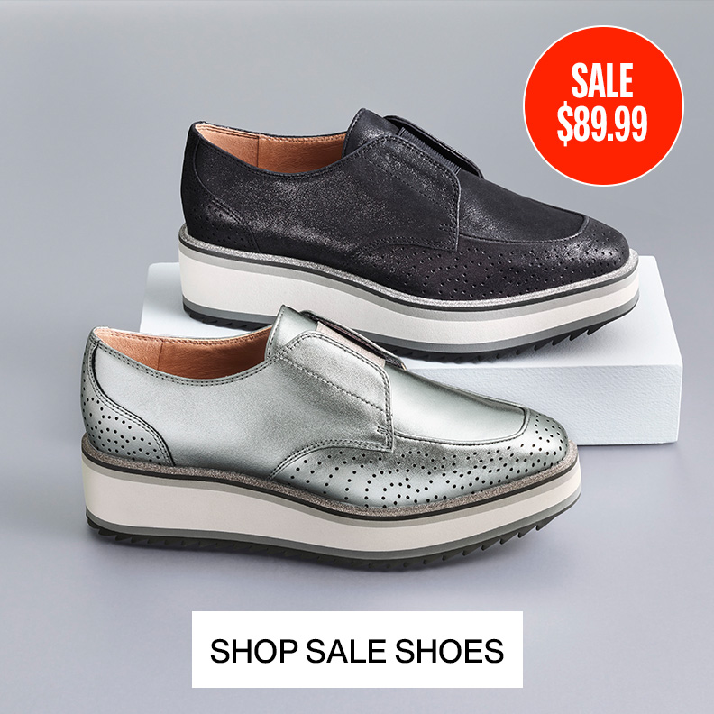 Two womens platform loafers One in black and one in silver metallic.